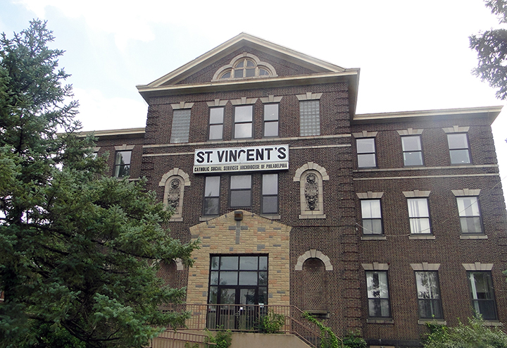 St. Vincent’s, as it appears today on the Delaware River in the Tacony neighborhood of Philadelphia. Large brick building with St. Vincint's over the door.